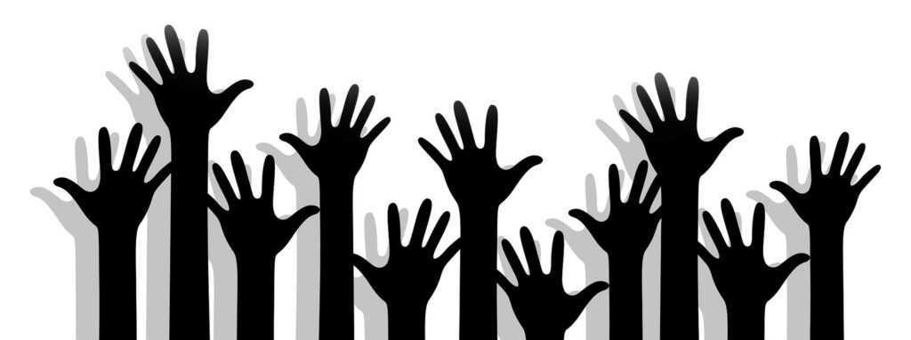 Volunteering Opportunities raised hands